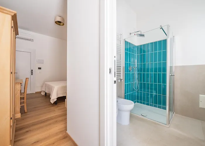 מלון דירות Olbia Rooms 3*